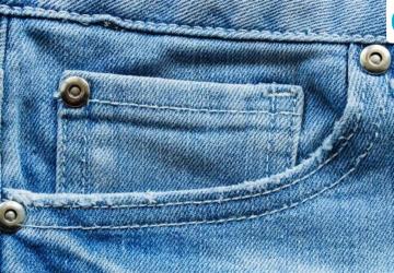 Why Jeans Have Small Metal Buttons on Their Pockets