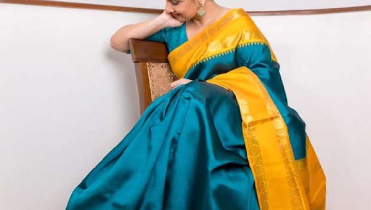Vidya Balan Celebrates Maha Navami in Peacock Green Saree
