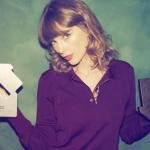 Taylor Swift Debuts New Shorter, Curly Hairstyle