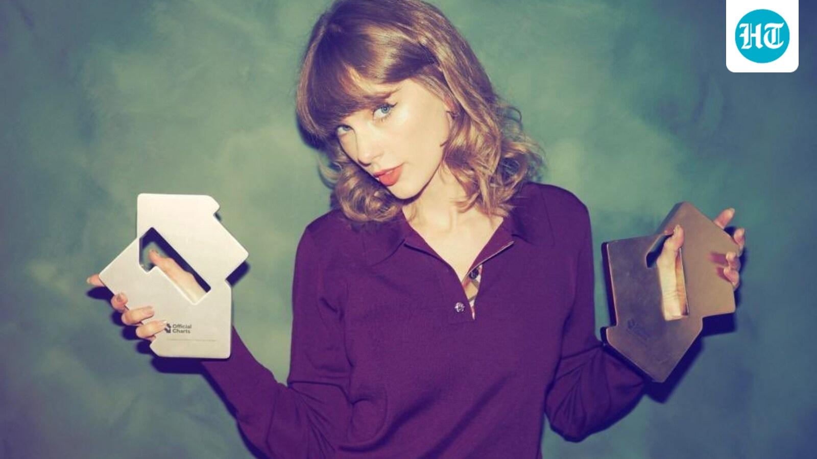 Taylor Swift Debuts New Shorter, Curly Hairstyle
